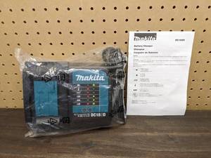 lot 48 image: New Makita DC18SD Battery Charger