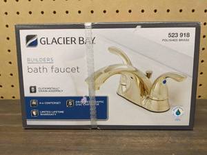 lot 165 image: New Glacier Bay Builders 4 in. Centerset 2-Handle Low-Arc Bathroom Faucet in Polished Brass