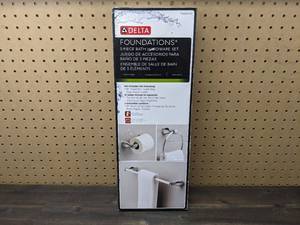 lot 181 image: New Delta Foundations 3-Piece Bath Hardware Set in Chrome with Towel Ring, Toilet Paper Holder, and 18 in. Towel Bar