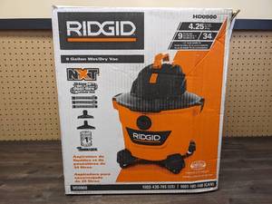 lot 28 image: RIDGID 9 Gallon 4.25 Peak HP NXT WetDry Shop Vacuum with Filter, Locking Hose and Accessories