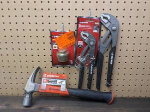 lot 40 image: Set of Husky 10 in. and 12 in. Quick Adjusting Groove Joint Pliers with Curved Jaw, a Husky Tub Drain Removal Tool, and a Crescent 20 oz. Fiberglass Rip Claw Hammer
