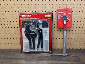 lot 149 image: Husky 4-Piece PVC Cutting Kit with Foldable Pouch and Replacement Blades and Husky 1-12 in. Quick-Release Telescoping Basin Wrench
