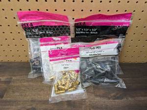 lot 128 image: Assortment of Apollo PEX 12 in. Brass PEX-B Barb 90 Elbows, 12 in. Brass PEX-B Barb x 12 in. Female Copper Sweat Adapters, 12 in. Poly-Alloy PEX-A Expansion Barb 90 Elbows, and 12 in. Poly-Alloy PEX-A Expansion Barb Tees