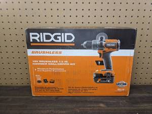 lot 29 image: RIDGID 18V Brushless Cordless 12 in. Hammer DrillDriver Kit with 4.0 Ah MAX Output Battery, 18V Charger, and Tool Bag