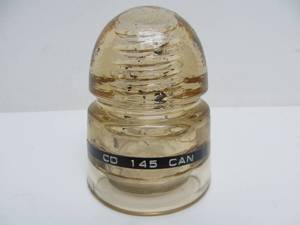 lot 107 image: No Name Antique CD 145 YellowishHoney Colored Glass Insulator