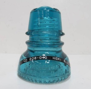 lot 87 image: Hemingray CD 208 Cross X-Top Aqua Blue Glass Insulator
