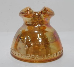 lot 89 image: Antique Pyrex Carnival Glass No. 63 Insulator