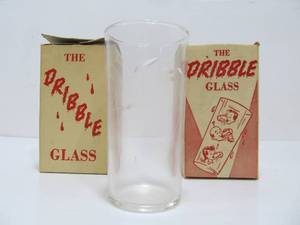 lot 134 image: 2 Vintage 1950s Novelty Prank Drinking Glasses - The Dribble Glass