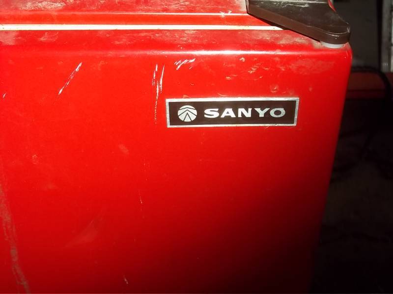 Red Sanyo Mini-Fridge with very min...