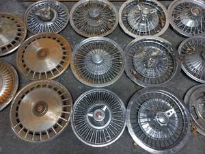 lot 11 image: Collection of 14 Hubcaps