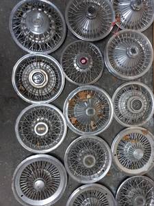 lot 12 image: Collection of 15 Hubcaps