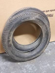 lot 60 image: Two Ford Model A, Model B, or Model T Tires