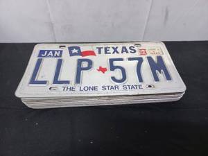 lot 77 image: Assortment of 13 License Plates