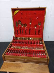 lot 109 image: Large Set of Brass and Wooden Handle Flatware