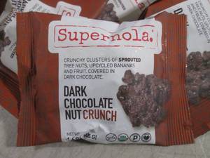 lot 94 image: (B-1) 24 Bags Supernola Dark Chocol...
