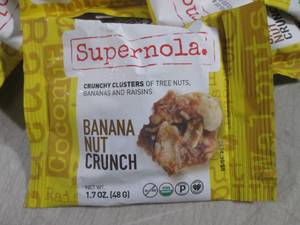 lot 95 image: (B-1) 24 Bags Supernola Banana Nut ...