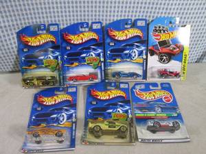 lot 124 image: (EC1) Assorted Hot Wheels in Packag...