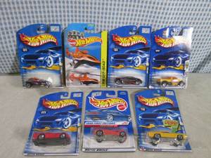 lot 125 image: (EC1) Assorted Hot Wheels in Packag...