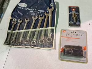 lot 406 image: Lot of (3) Hand Tools - SE Tools Multi-Function Knife, Neiko Tools Step Drill Bit, K&F 7-piece Combination Wrench Set SAE