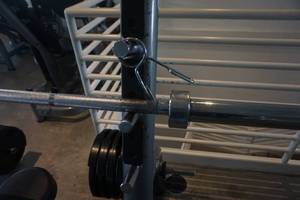 lot 56 image: Olympic Style 45 lb Barbell With 2 Clamps