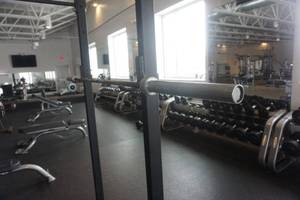 lot 58 image: Olympic Style 45 lb Barbell