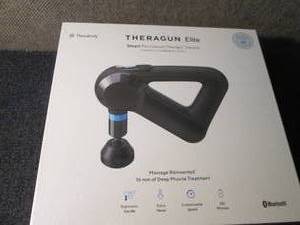 lot 5 image: Theragun Elite - Handheld Electric ...