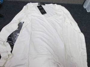 lot 79 image: Ladies Large Long Sleeved Vneck Tee...