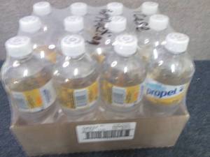 lot 515 image: 12- 24 oz Bottles Propel Mango...
