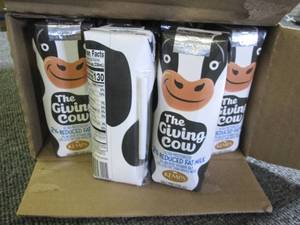 lot 169 image: case of 24 kemps the giving cow red...