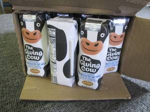 lot 171 image: case of 24 kemps the giving cow red...