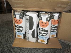 lot 174 image: case of 24 kemps the giving cow red...