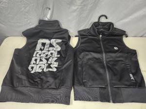 lot 46 image: 2 New UFC As good as it gets Soft Shell Vests