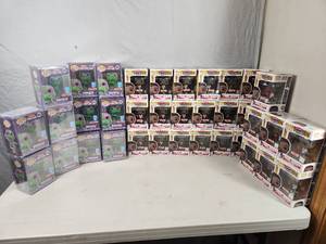 lot 113 image: Bulk Lot of 36 Donatello and Magic Johnson Funko Pops