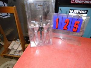 New 2 jaw gear puller approx 6 - 8. As shown.