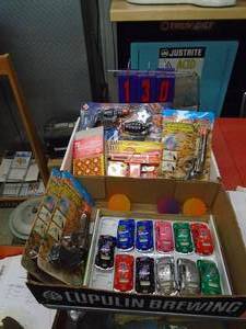 Qty of 2 flats of cap guns & VW toys. As shown.