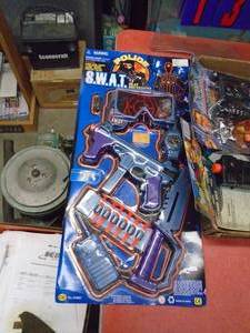 Flat of toy guns. As shown.