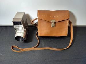 lot 8 image: Vintage Bell & Howell Electric Eye COMAR Zoom Movie Camera and Leather Carrying Case