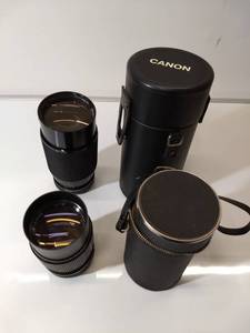 lot 12 image: Camera Lens Lot with Lens Cases
