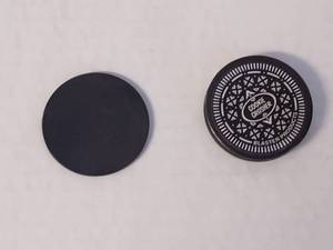 lot 86 image: Beautiful X-Men Gold and Black Heavy Pog and Realistic Oreo Pog