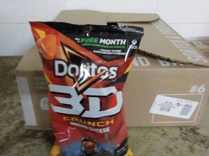 lot 57 image: Case of 8 - 7 14 oz Bags Doritos 3...