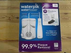 lot 15 image: Waterpik Ultra Plus and Cordless Select Water Flosser Combo Pack
