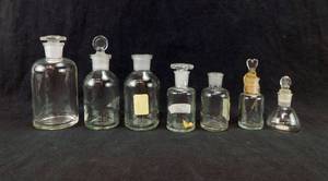 lot 56 image: Lot of 7 Assorted Glass Bottles