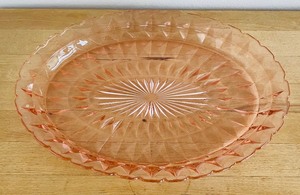lot 102 image: Vintage Colored Glass Serving Pieces including Pink Depression Glassware