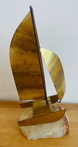 lot 105 image: Vintage Metal and Rock Sailboat Figurine