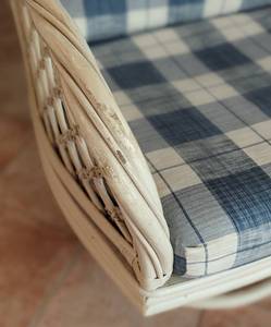 lot 33 image: White Rattan Rocker