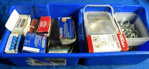 lot 25 image: Plastic Tote of Screws and Hyper Tough DeadBolt (In the Box)