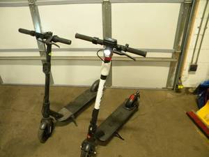 lot 45 image: 2 Foldable Electric Scooters (One Does Not Power Up at All)