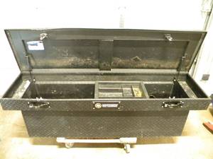 lot 59 image: Northern Tool Aluminum Truck Tool Box  (Battery Charger and Other Miscellaneous Items)