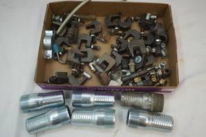 lot 132 image: metal pipe fittings, clamps