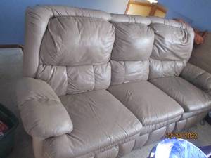 Faux leather couch with two push bu...